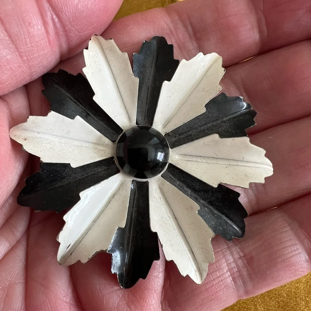 Vintage floral brooch black&white enamel petals and solid black center.